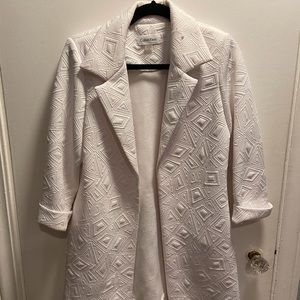 Calvin Klein white quilted jacket.